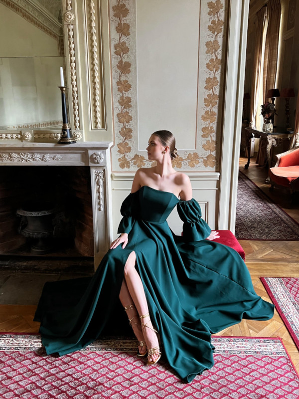 Seniorita bottle green - long corseted flared gown with falling sleeves