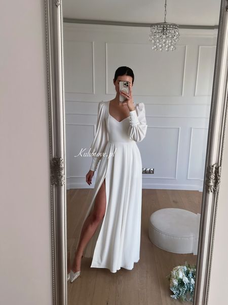 Taylor A344 - flared long ecru wedding dress with buff sleeves and pockets