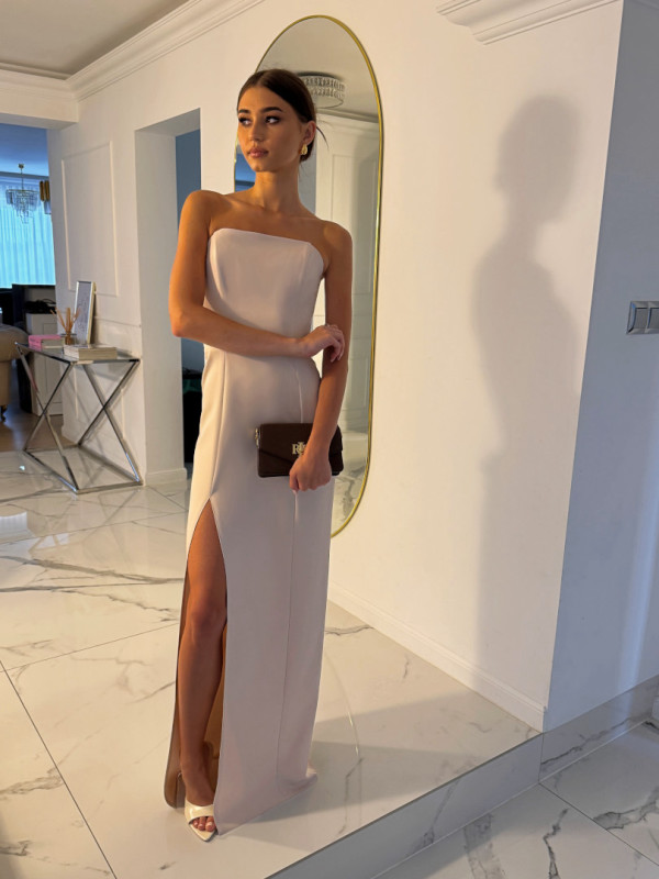 Emily - a simple dress in a light beige shade with a corset top