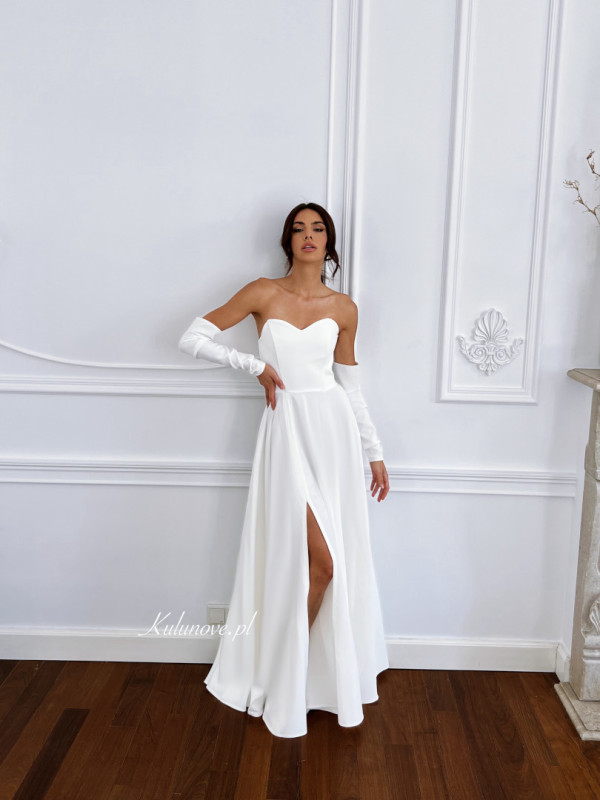 Judith - corseted flared wedding dress in ecru color with additional sleeves