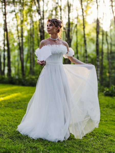 Moana - corset wedding dress with Spanish neckline with open shoulders