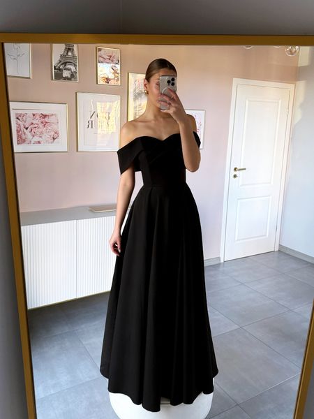 Angelina maxi - black maxi dress sewn on a wide circle with a striking neckline revealing the shoulders