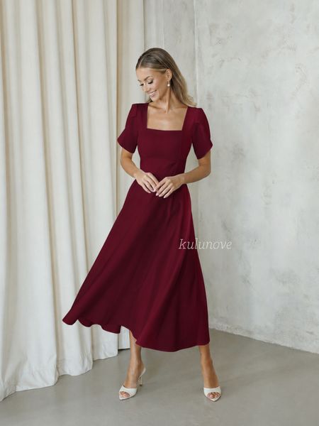 Arletta - burgundy midi dress with a flared hem and decorative sleeves