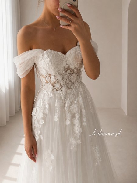 Ashley - a romantic wedding dress with a floral bodice and sequined tulle