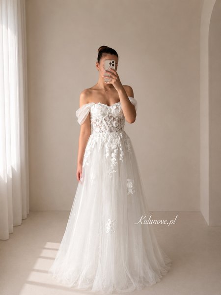Ashley - a romantic wedding dress with a floral bodice and sequined tulle