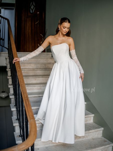 Bombshell - elegant ecru princess type wedding dress with corset top and flared bottom