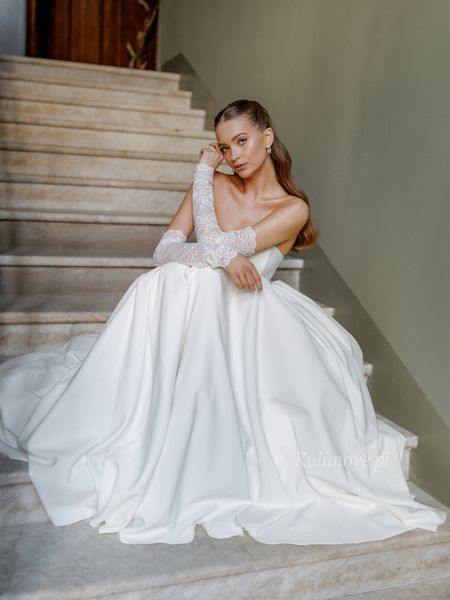 Bombshell - elegant ecru princess type wedding dress with corset top and flared bottom