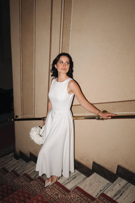 Prima - white midi dress with halter neckline and deep back neckline