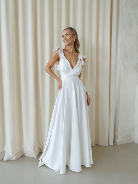 Evelina - wedding dress in ecru color with delightful skirt deep neckline and open back, with frilly straps