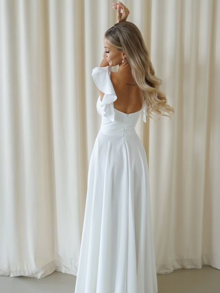 Evelina - wedding dress in ecru color with delightful skirt deep neckline and open back, with frilly straps