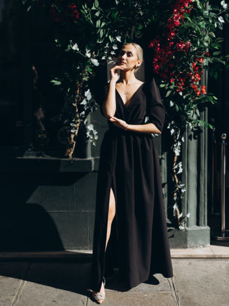 Laurell - black maxi dress with deep neckline with buffets