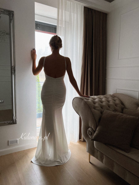 Milano - fitted wedding dress with train and open back in cream color