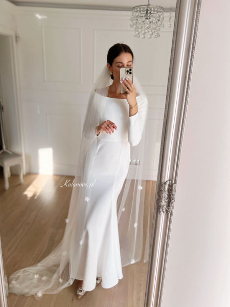 Charlene - a simple elegant fitted long sleeve wedding dress with a boat neckline