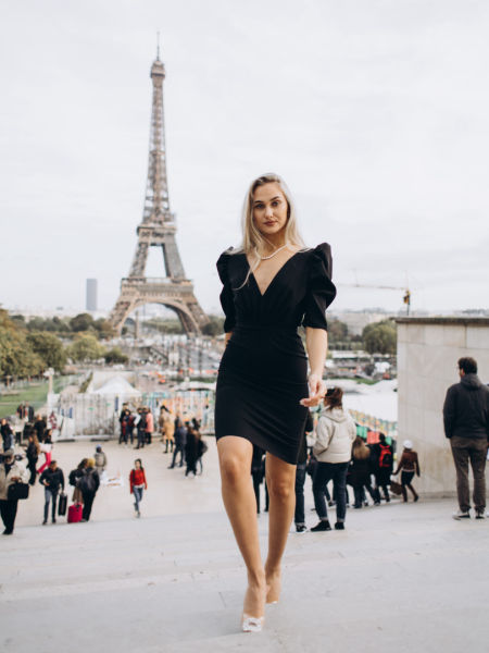 Laurell - knee length dress in black with deep neckline and buffets