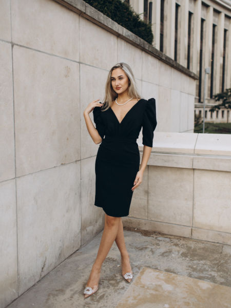 Laurell - knee length dress in black with deep neckline and buffets