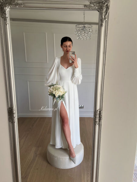 Taylor - flared long ecru wedding dress with buff sleeves and pockets