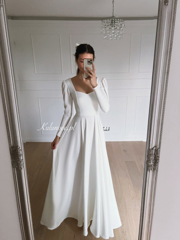 Julia - minimalist long sleeve wedding dress with buffets
