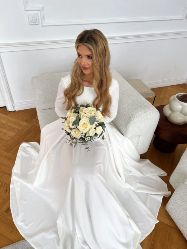 Genevieve - minimalist ecru wedding dress on wide circle with long sleeve back neckline
