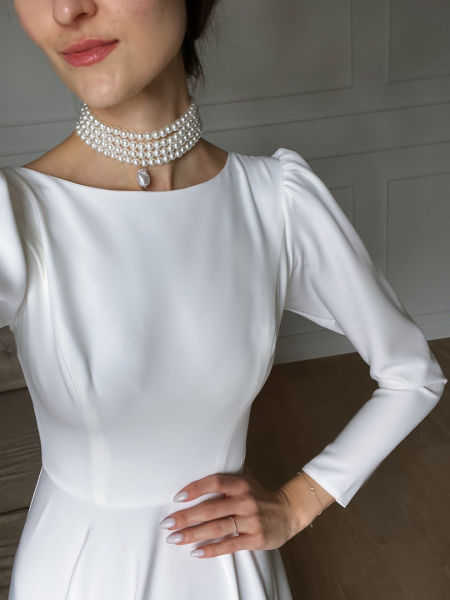 Snow - long sleeve wedding dress on a wide circle