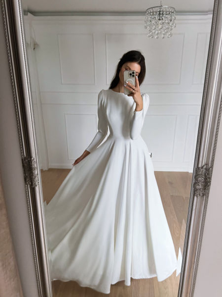 Snow - long sleeve wedding dress on a wide circle