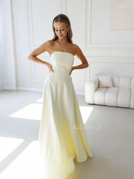 Hannah - a butter-colored, strapless maxi dress with a flared skirt