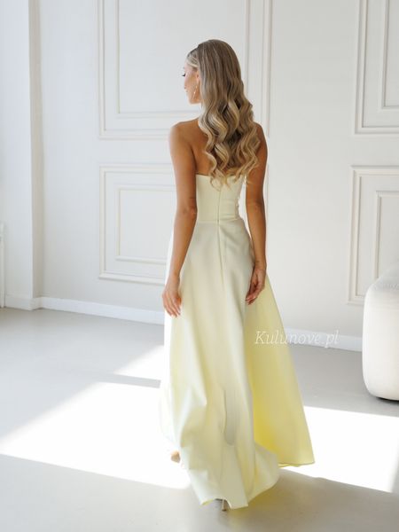 Hannah - a butter-colored, strapless maxi dress with a flared skirt