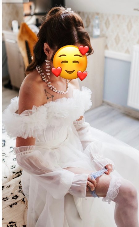 Moana - corset wedding dress with Spanish neckline with open shoulders