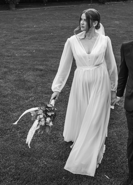 Alexandra - a minimalist wedding dress with a built-in front and an open back decorated with straps