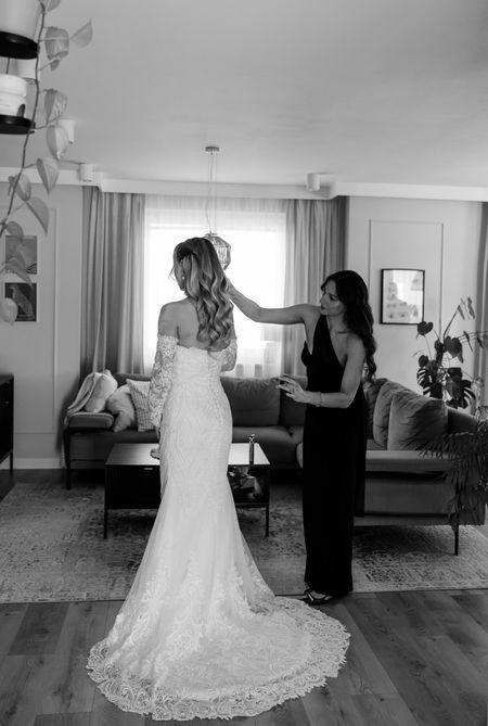 Seraphina - premium wedding dress richly decorated with lace and beads with a train and additional sleeves