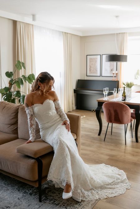 Seraphina - premium wedding dress richly decorated with lace and beads with a train and additional sleeves