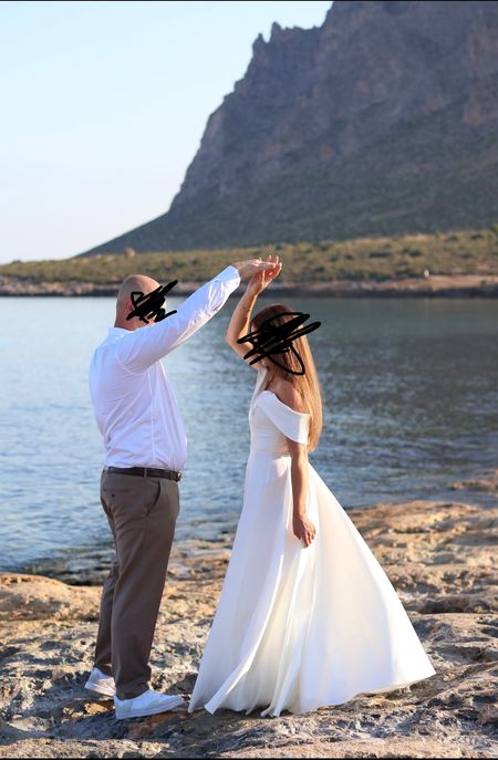 Angelina maxi - ecru colored wedding dress sewn on a wide circle with bare shoulders