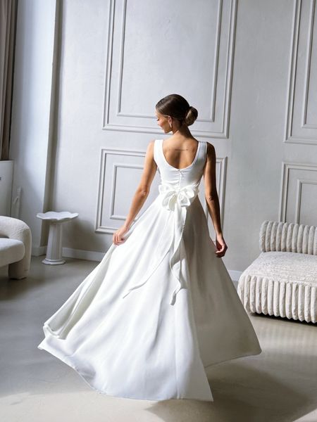 Josette - ecru dress with karo neckline with leg slit and bow