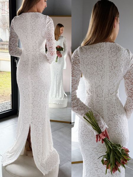 Kora - fitted lace long sleeve wedding dress with a fishtail cut