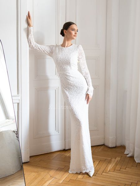 Kora - fitted lace long sleeve wedding dress with a fishtail cut