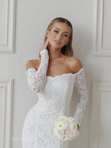 Lace - a long-sleeved, off-the-shoulder maxi wedding dress with a Spanish-style neckline