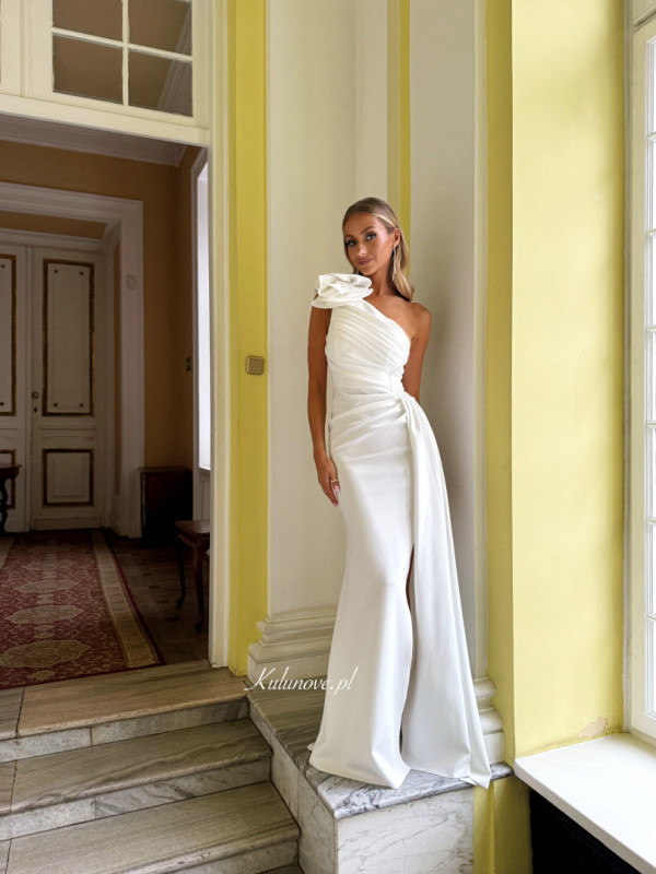 Melanie - a fitted one-shoulder wedding dress with a ruffled neckline and decorative crystals with fine lines