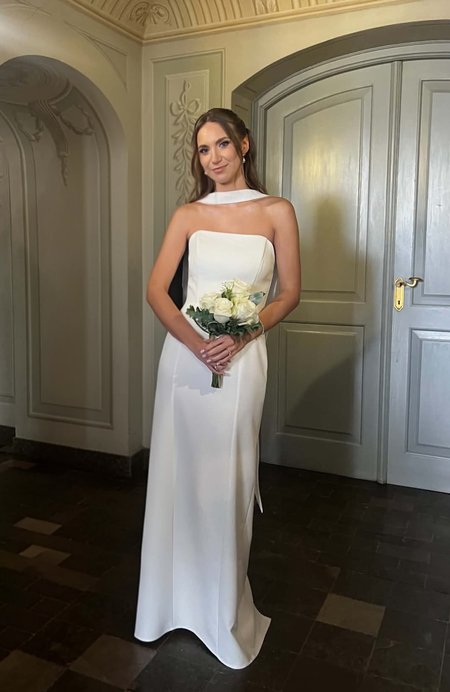 Liv Maxi - An ecru wedding dress with bare shoulders and a decorative shawl