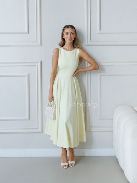 Nora midi - a flared midi dress in butter color with a built-in neckline