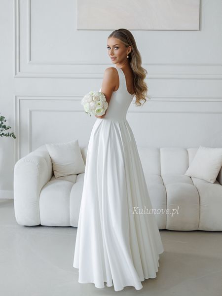 Oriana - simple ecru colored wedding dress with wide straps and ball gown bottom