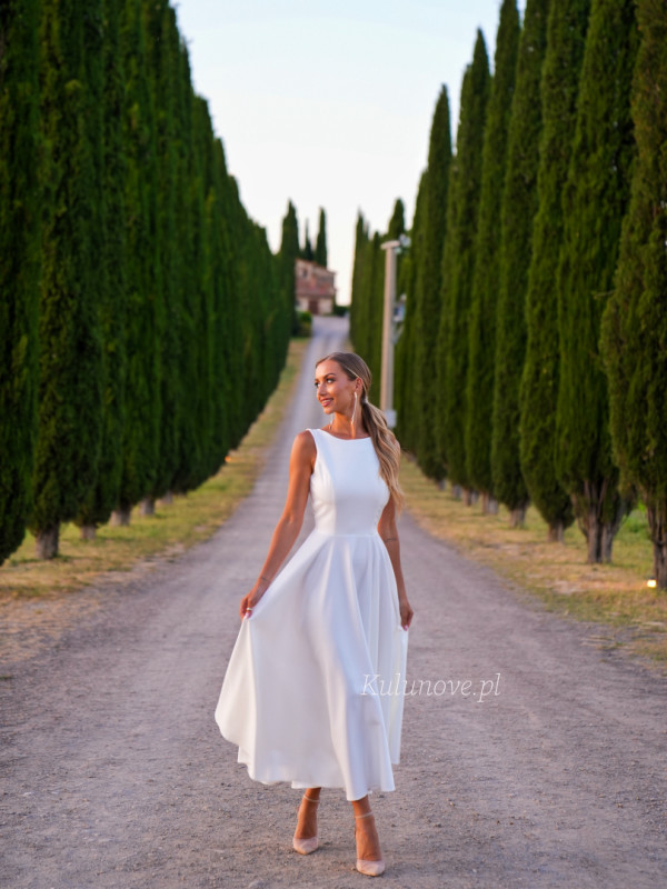Prima - white midi dress with halter neckline and deep back neckline