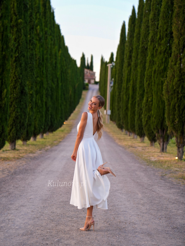 Prima - white midi dress with halter neckline and deep back neckline