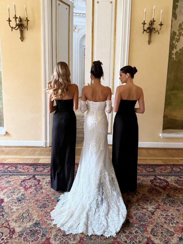 Seraphina - premium wedding dress richly decorated with lace and beads with a train and additional sleeves