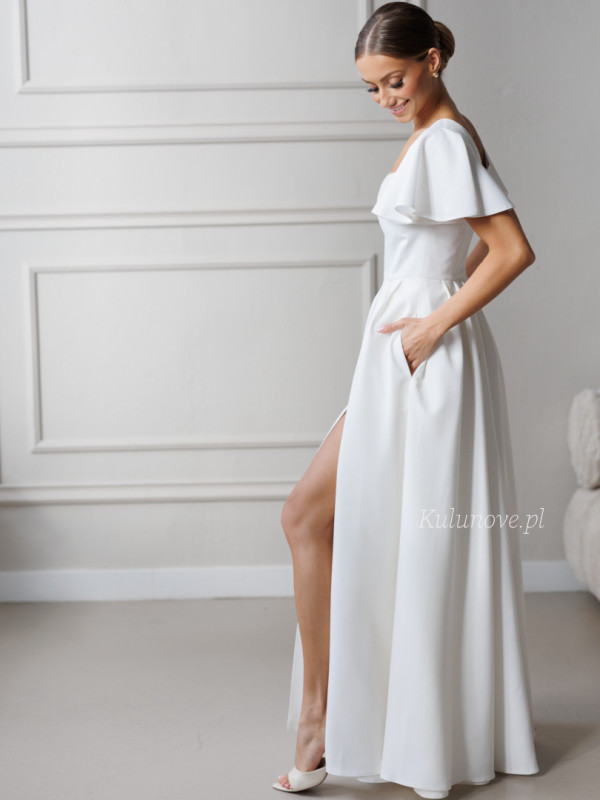 Loren - ecru gown with striking sleeves and leg slit