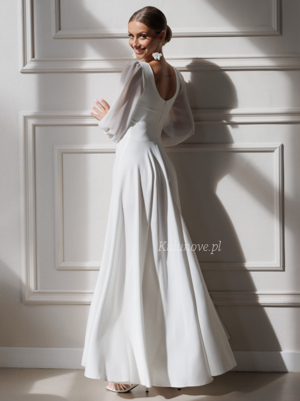 Tamira - long spreading wedding dress with karo neckline and buff chiffon sleeves
