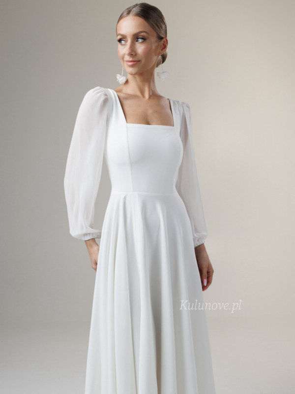 Tamira - long spreading wedding dress with karo neckline and buff chiffon sleeves