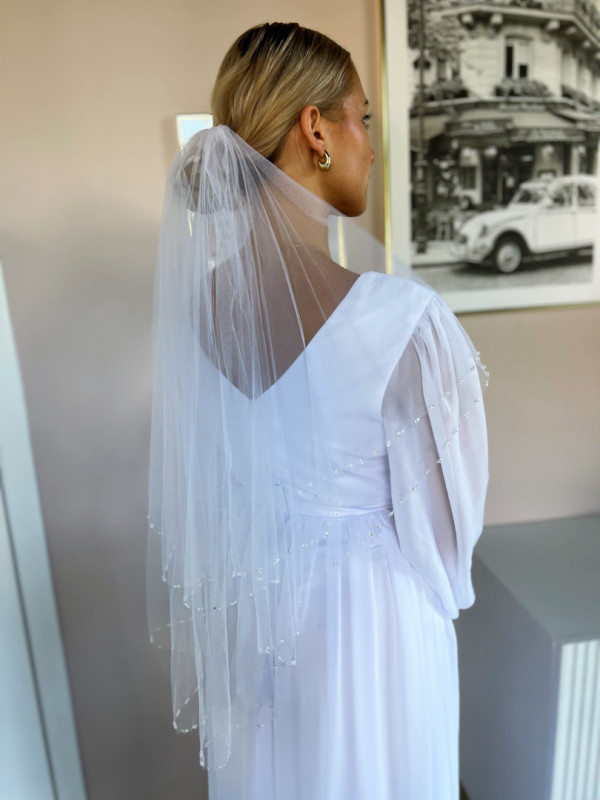 Short double-layered wedding veil with crystals at the end in snow white color