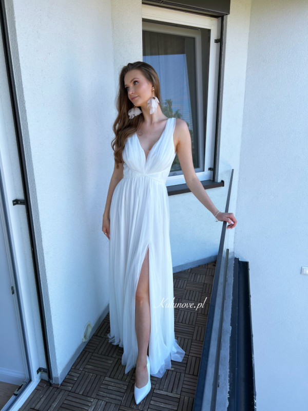 Zendaya - long ethereal ecru wedding dress with thicker straps tied at the waist
